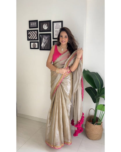 Acclaim the Elegance of Golden Brown Uppada Tissue Silk Saree with Designer Charm