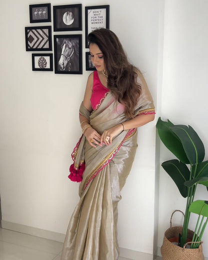 Acclaim the Elegance of Golden Brown Uppada Tissue Silk Saree with Designer Charm