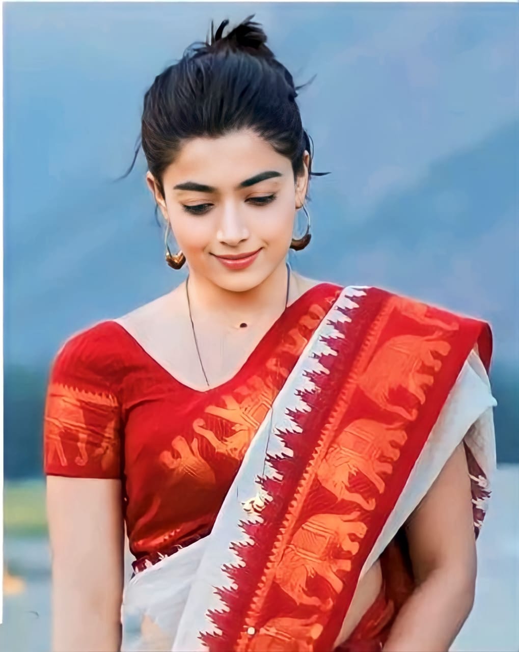 Stunning White Soft Silk Kanjivaram Saree with Gorgeous Matching Red Border Design