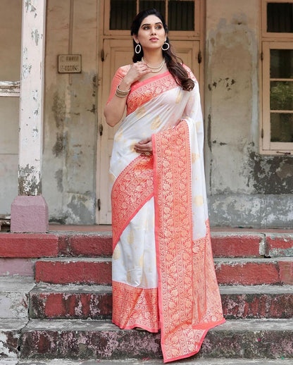 Graceful White Silk Saree Featuring Gold Embroidery and Elegant Coral Pallu