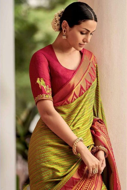 Premium Parrot Green Kanjivaram Saree with Mesmerizing Design and Perfect Matching Border