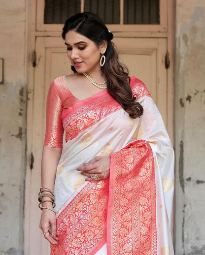 Graceful White Silk Saree Featuring Gold Embroidery and Elegant Coral Pallu