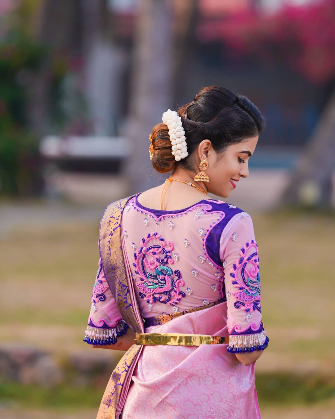 Mesmerizing Peacock Motif Pink Kanjivaram Silk Saree with Blue Matching Border