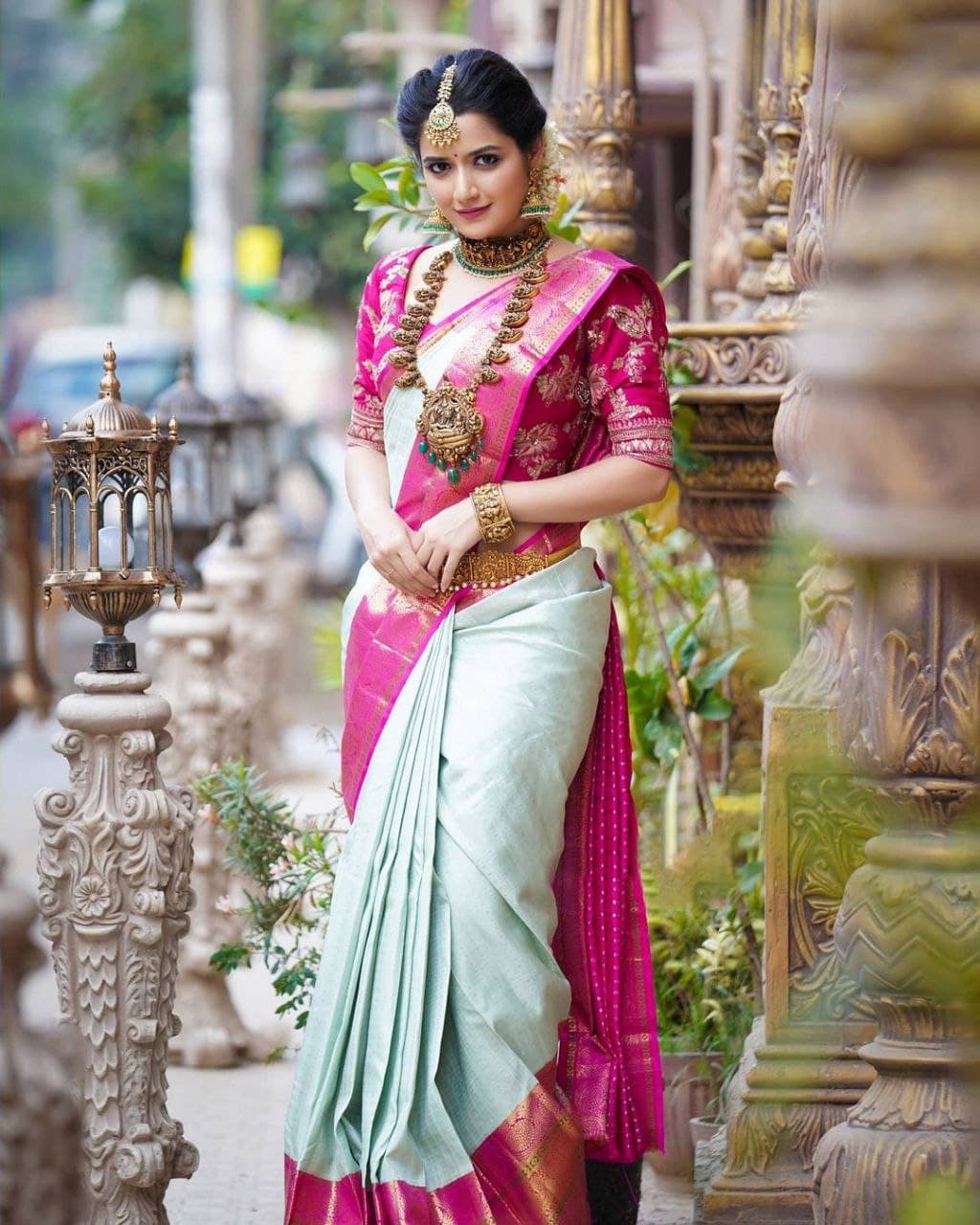 Graceful Charm: Traditional Saree with Vibrant Pink Border and Gold Zari Accents