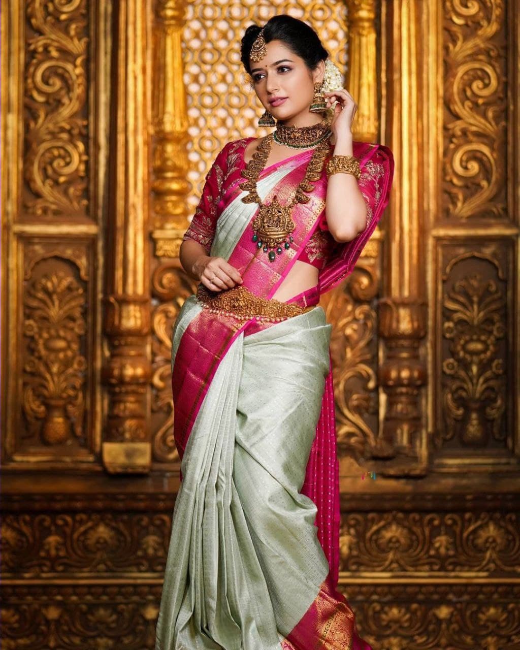 Graceful Charm: Traditional Saree with Vibrant Pink Border and Gold Zari Accents