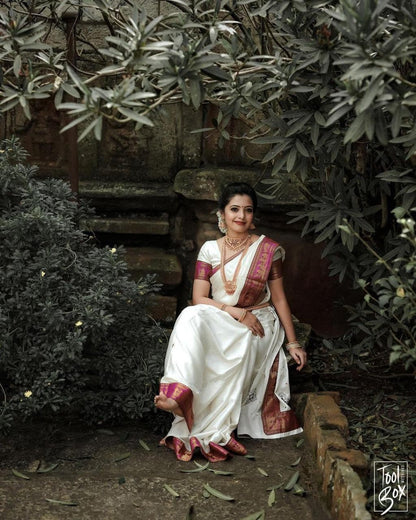 Elegant White Kanjivaram Saree with Contrasting Pink Border