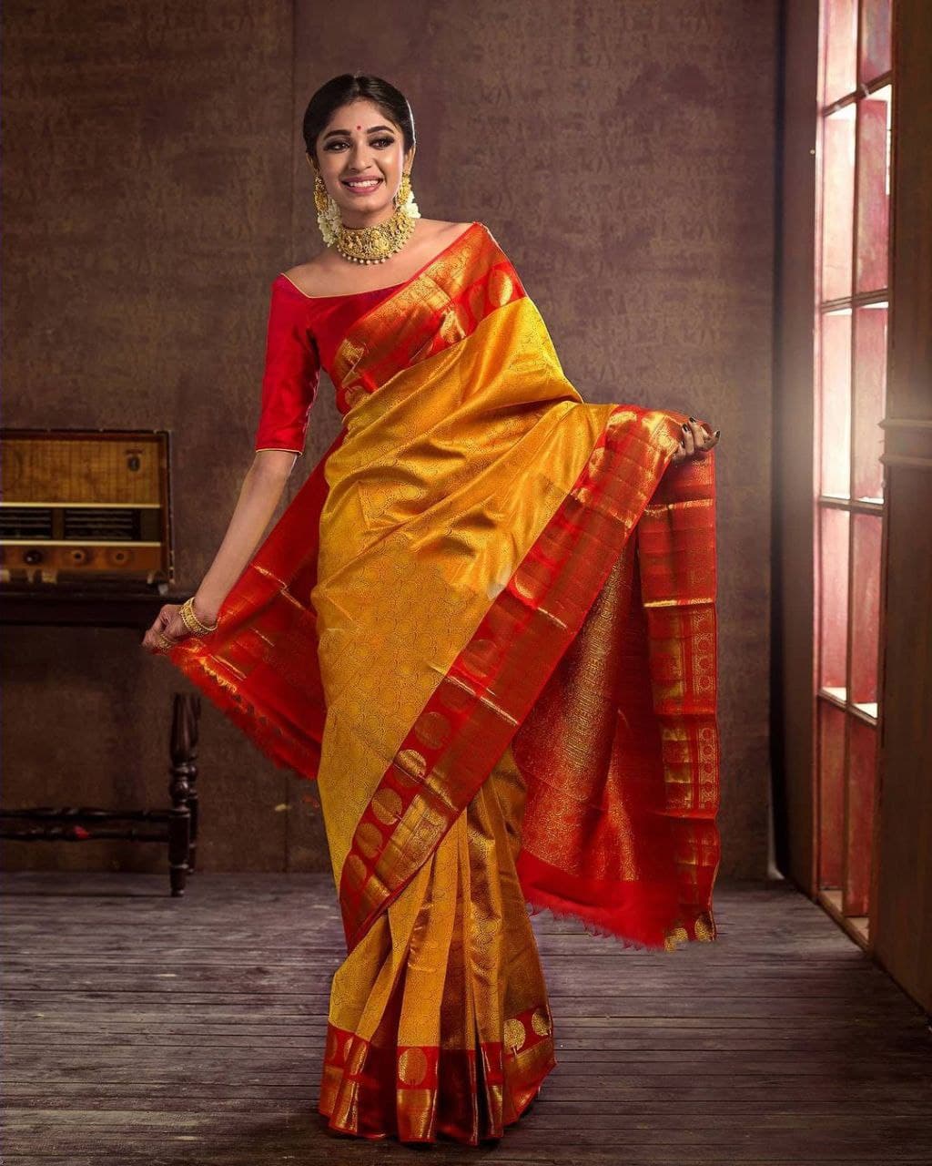 Traditional Indian Beauty: Mustard Yellow Kanjeevaram Saree with Elegant Gold Detailing