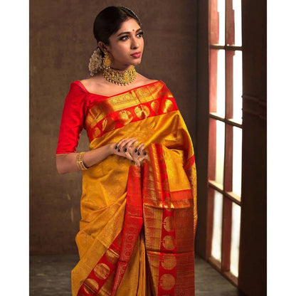 Traditional Indian Beauty: Mustard Yellow Kanjeevaram Saree with Elegant Gold Detailing