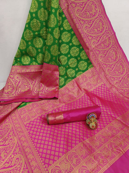 Vibrant Green Silk Saree with Radiant Pink Designer Border