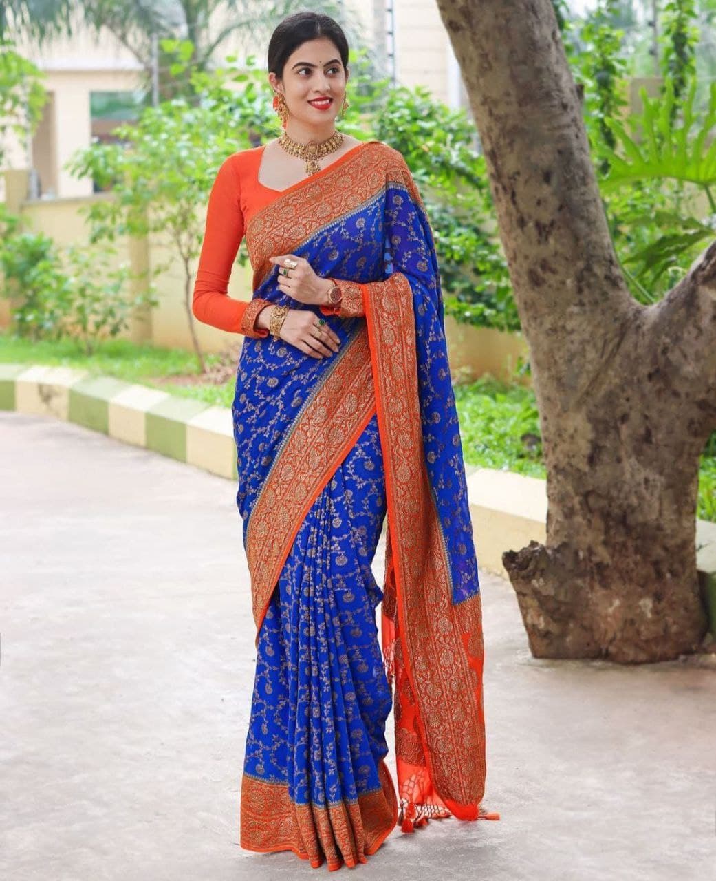 Elegant Blue Kanjivaram Silk Saree with Orange Border – Perfect for Festive Glam!