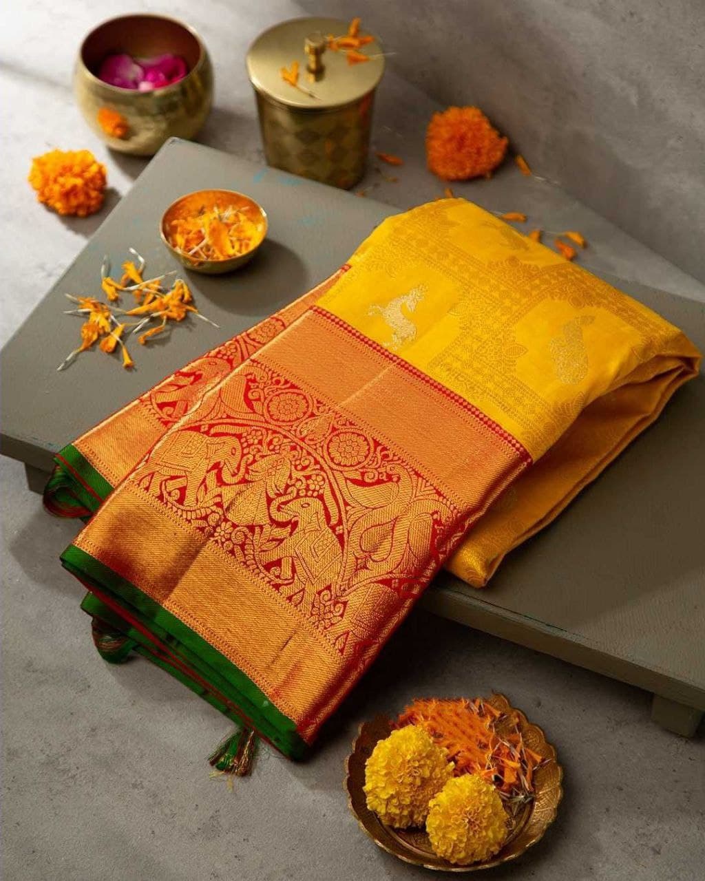 Traditional Yellow Soft Silk Kanjivaram Saree with Eye-Catching Matching Border