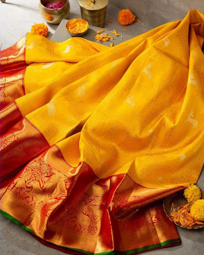 Traditional Yellow Soft Silk Kanjivaram Saree with Eye-Catching Matching Border