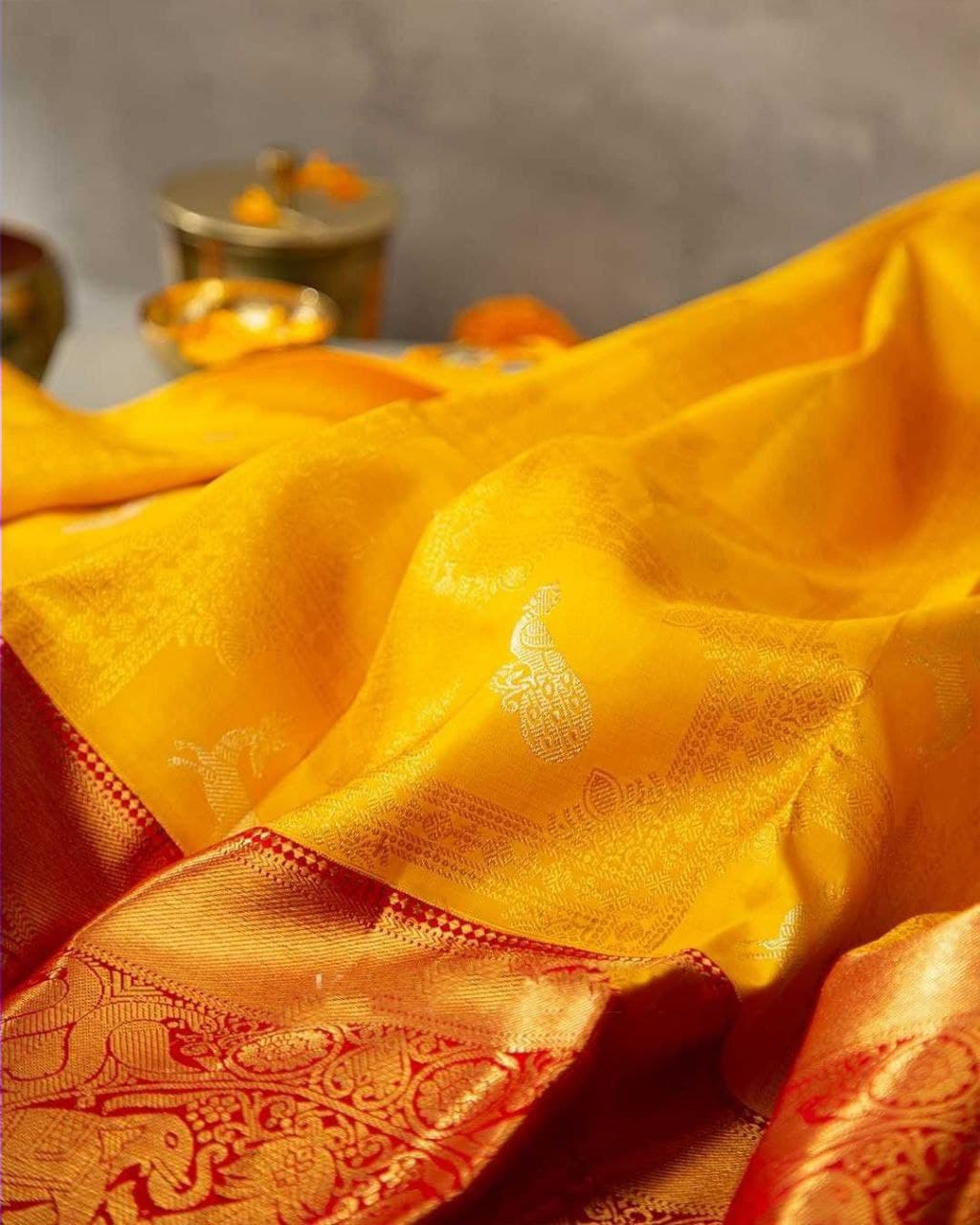 Traditional Yellow Soft Silk Kanjivaram Saree with Eye-Catching Matching Border