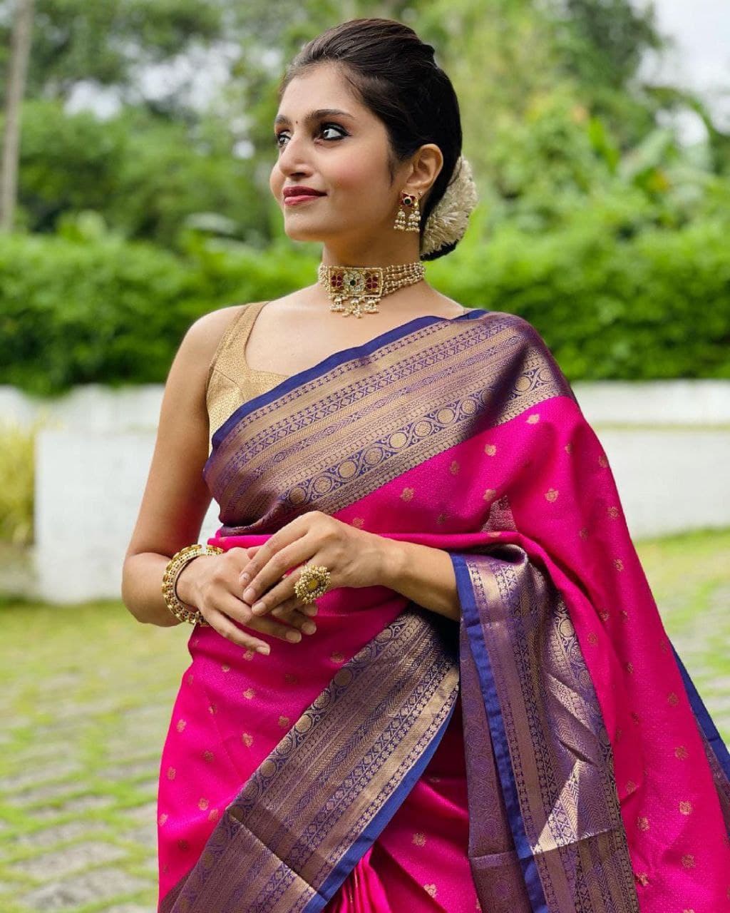 Elegant Pink Saree with Golden Motifs and Contrasting Designer Pallu