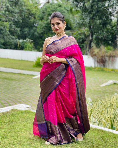 Elegant Pink Saree with Golden Motifs and Contrasting Designer Pallu