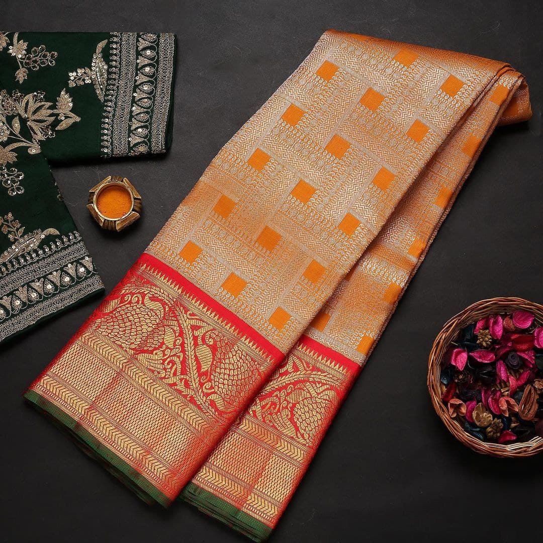 Vibrant Kanjivaram Silk Saree with Majestic Red, Orange and Green Accents