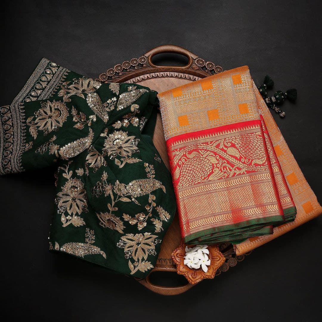 Vibrant Kanjivaram Silk Saree with Majestic Red, Orange and Green Accents