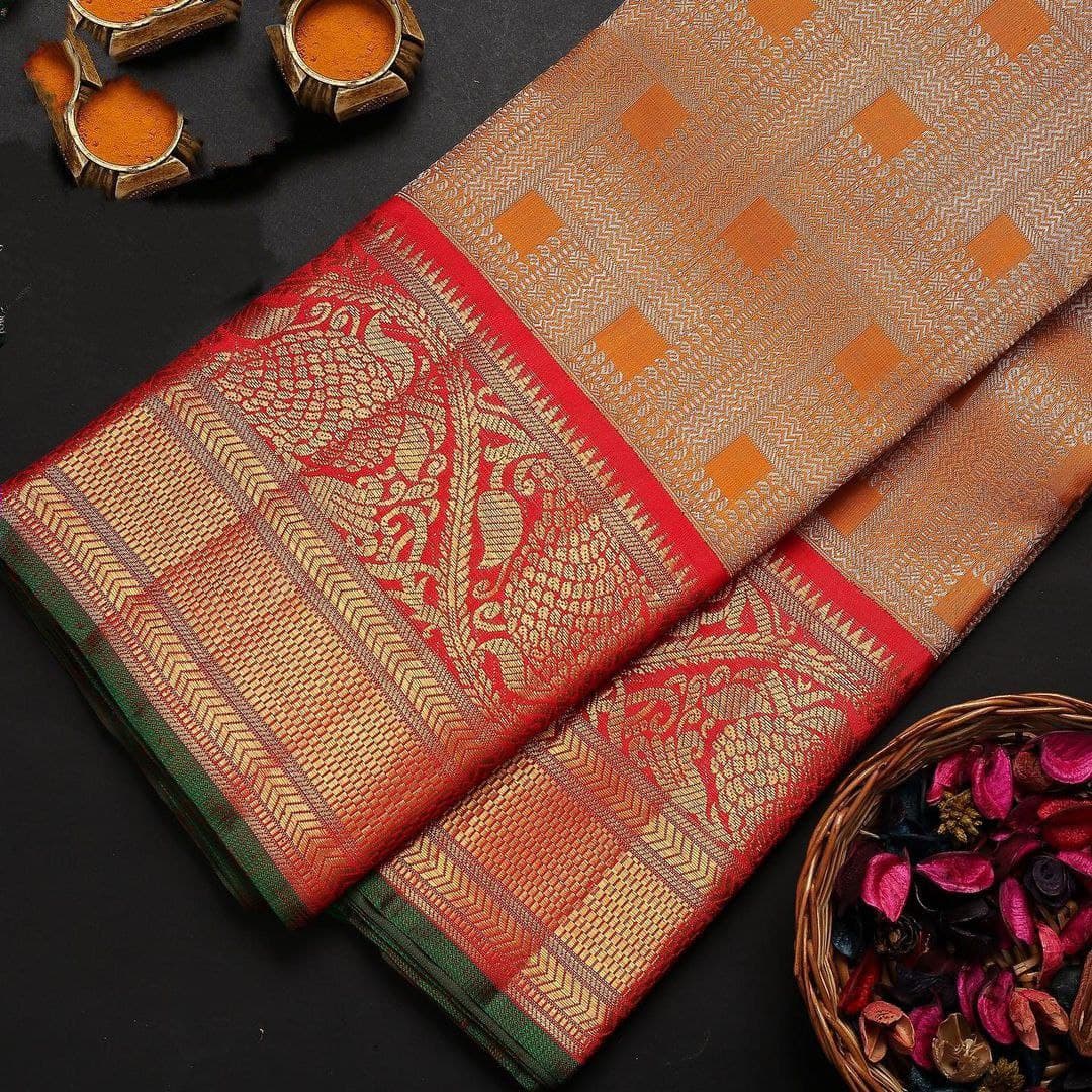 Vibrant Kanjivaram Silk Saree with Majestic Red, Orange and Green Accents