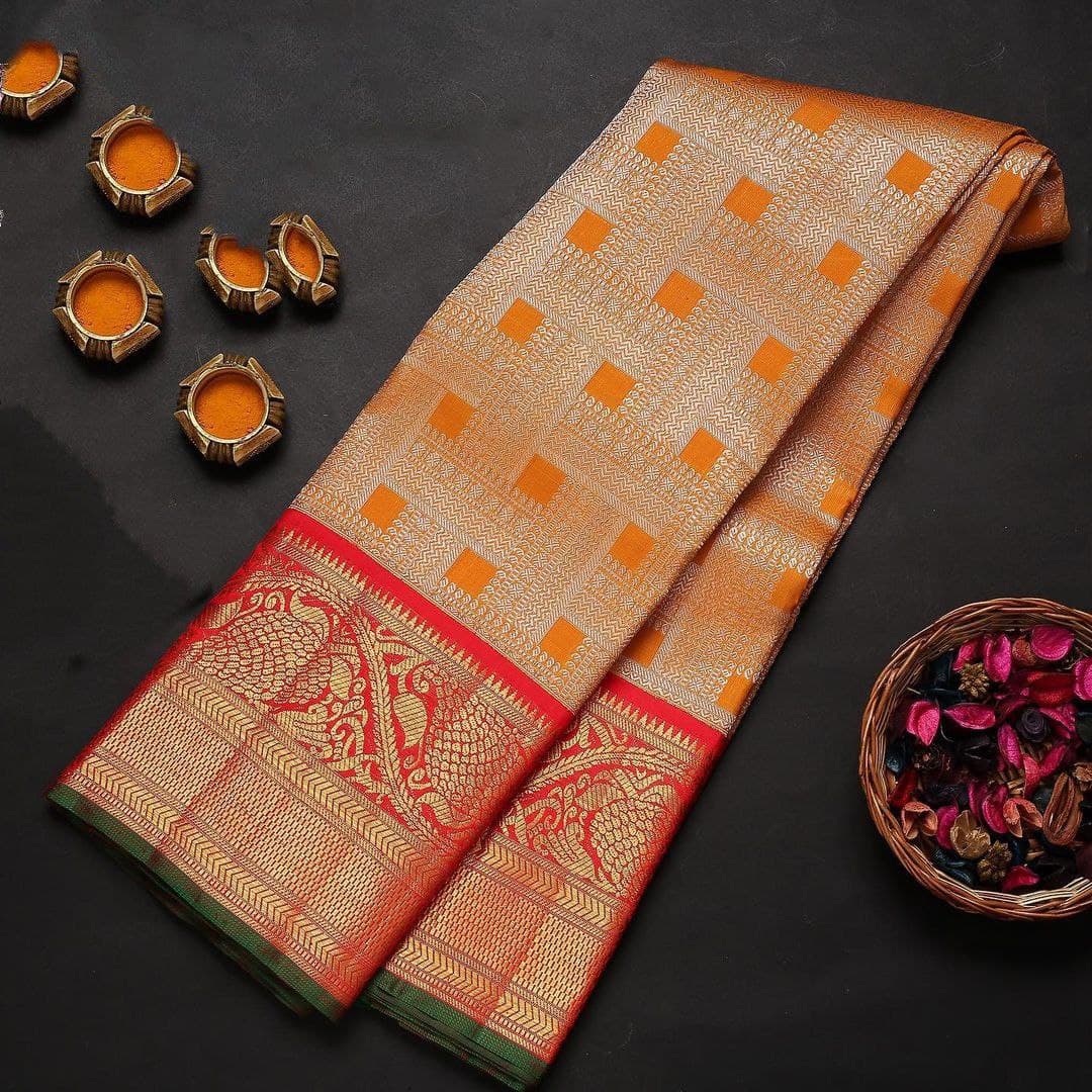 Vibrant Kanjivaram Silk Saree with Majestic Red, Orange and Green Accents