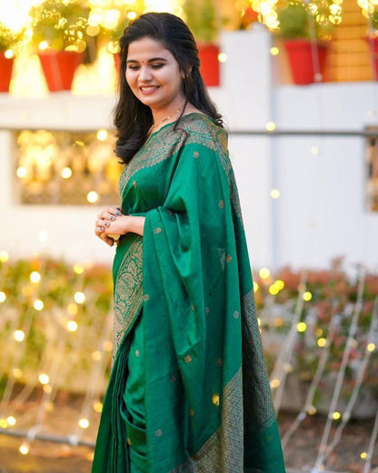 Alluring Green Kanjivaram Saree with Artistic Pallu and Elegant Matching Border