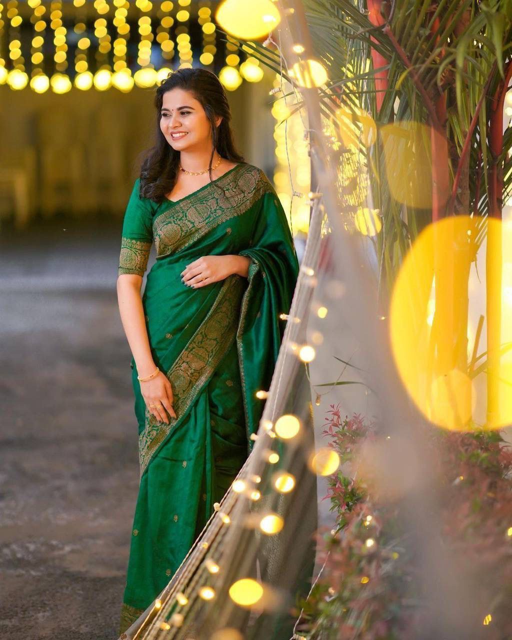 Alluring Green Kanjivaram Saree with Artistic Pallu and Elegant Matching Border