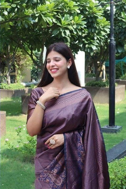 Outdoor Glamour: Woman in a Woven Purple-Brown Saree with Gold Detailing