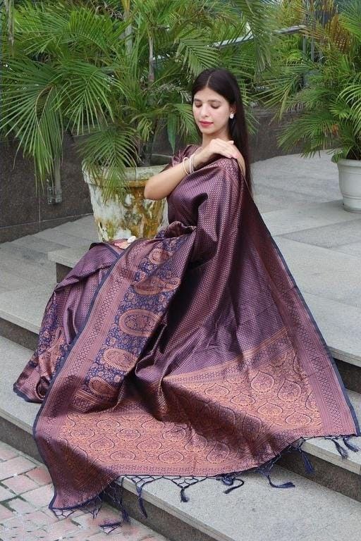 Outdoor Glamour: Woman in a Woven Purple-Brown Saree with Gold Detailing