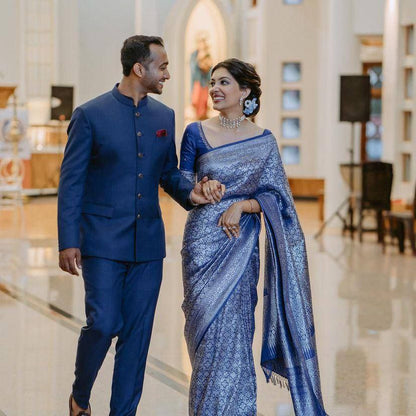 Graceful Elegance: Woman in Blue Silk Saree with Silver Detailing