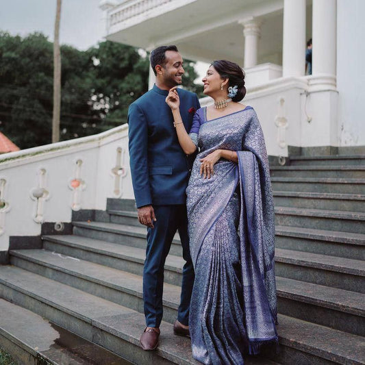 Graceful Elegance: Woman in Blue Silk Saree with Silver Detailing