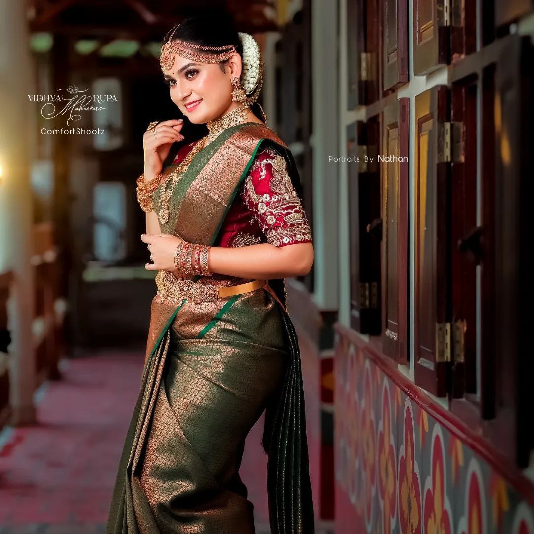 Your Perfect Celebration Look: Green Kanjivaram Saree with Golden Accents