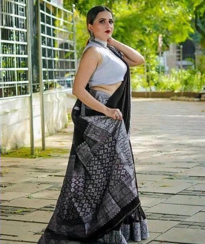 Stunning Black Color Kanjivaram Saree with Soft Silk Finish and Elegant Border