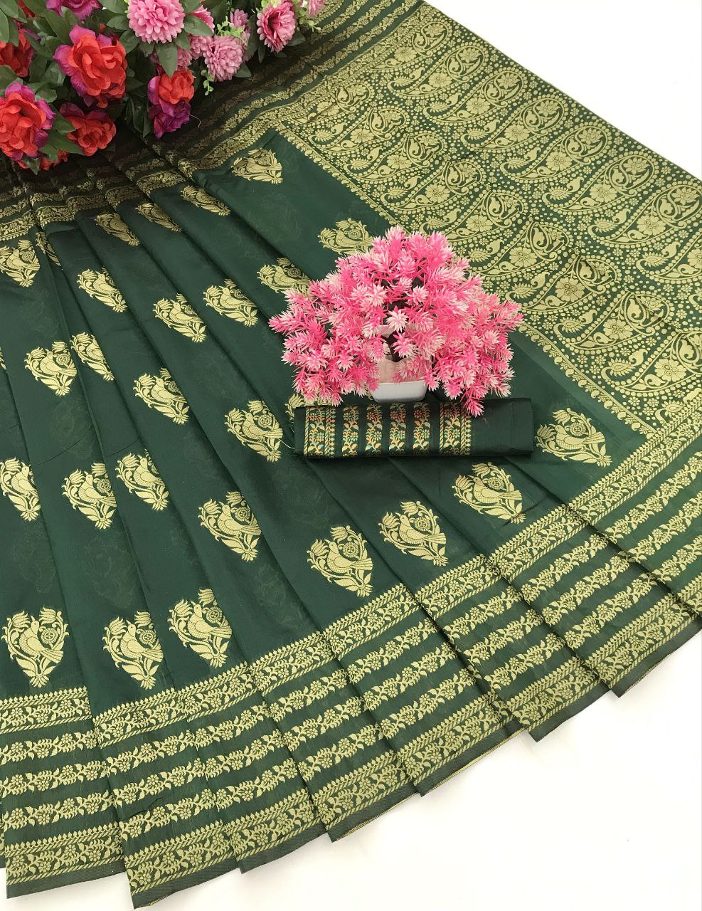 Elegant Contrast: Green Kanjivaram Saree with Pink Highlights and Peacock Motifs