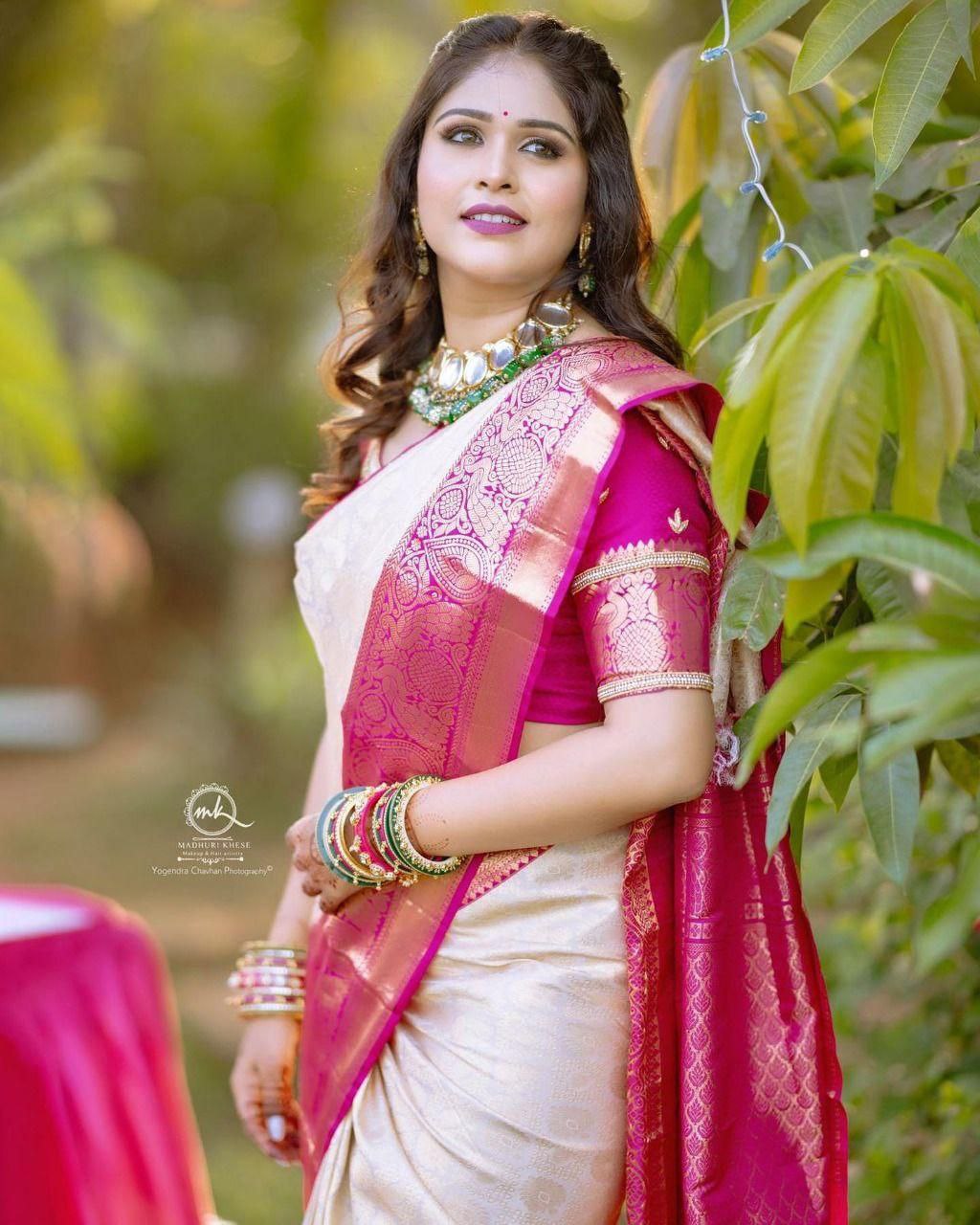 Traditional White Kanjivaram Silk Saree with Pallu and Matching Border Embellishments