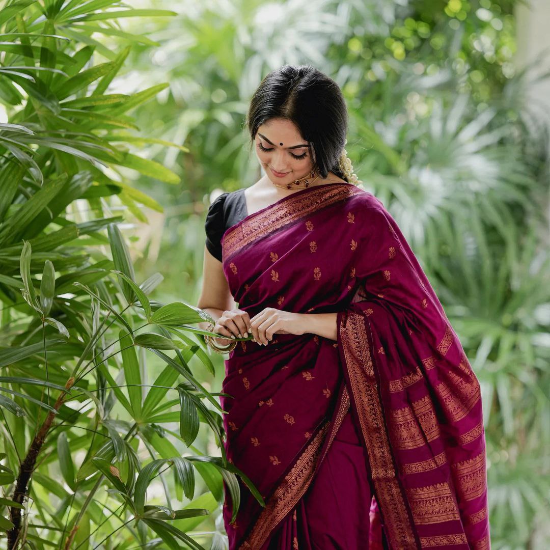 Classic Pink Kanjivaram Saree with Butti Motifs and Matching Border Highlight