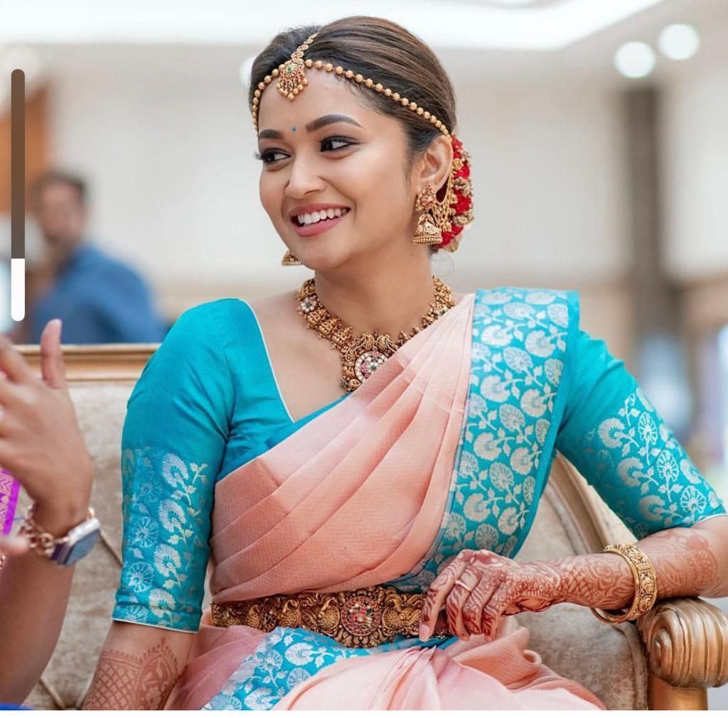 Graceful South Indian Bride in Luxurious Pastel Pink and Teal Silk Saree