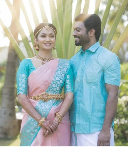 Graceful South Indian Bride in Luxurious Pastel Pink and Teal Silk Saree