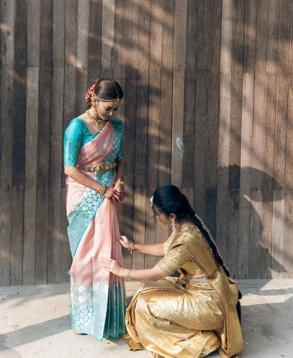 Graceful South Indian Bride in Luxurious Pastel Pink and Teal Silk Saree