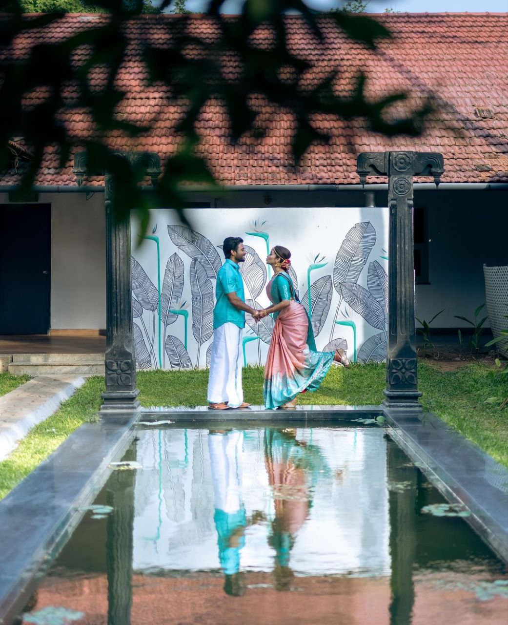 Graceful South Indian Bride in Luxurious Pastel Pink and Teal Silk Saree