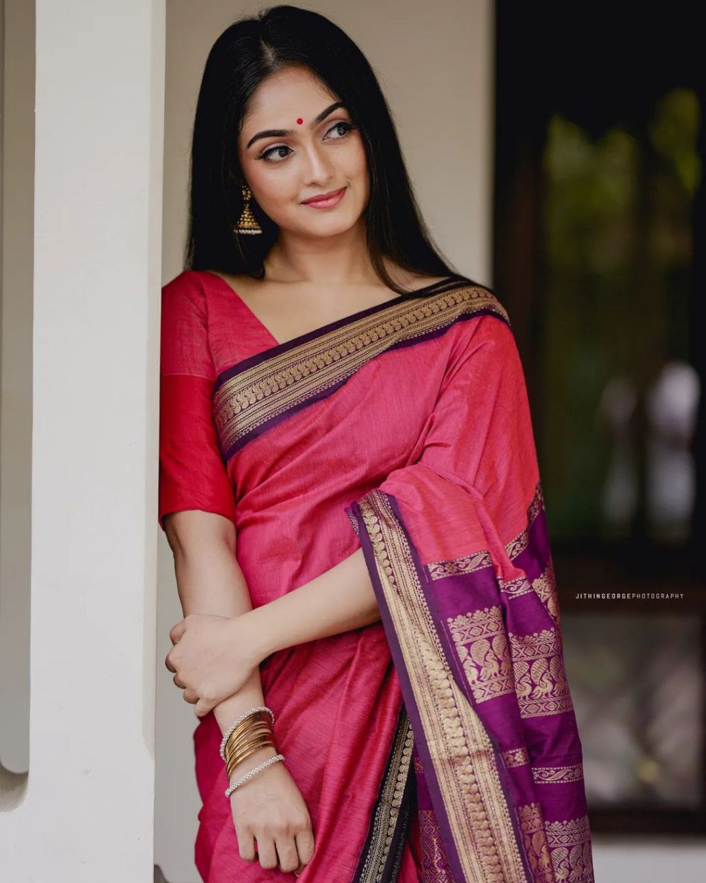 Graceful Pink Kanjivaram Soft Silk Saree Featuring Matching Border, Perfect for Weddings