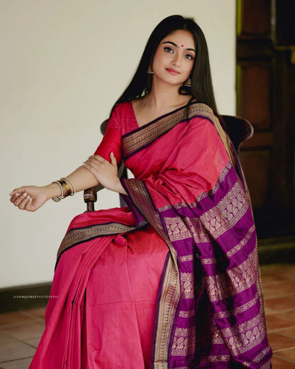 Graceful Pink Kanjivaram Soft Silk Saree Featuring Matching Border, Perfect for Weddings