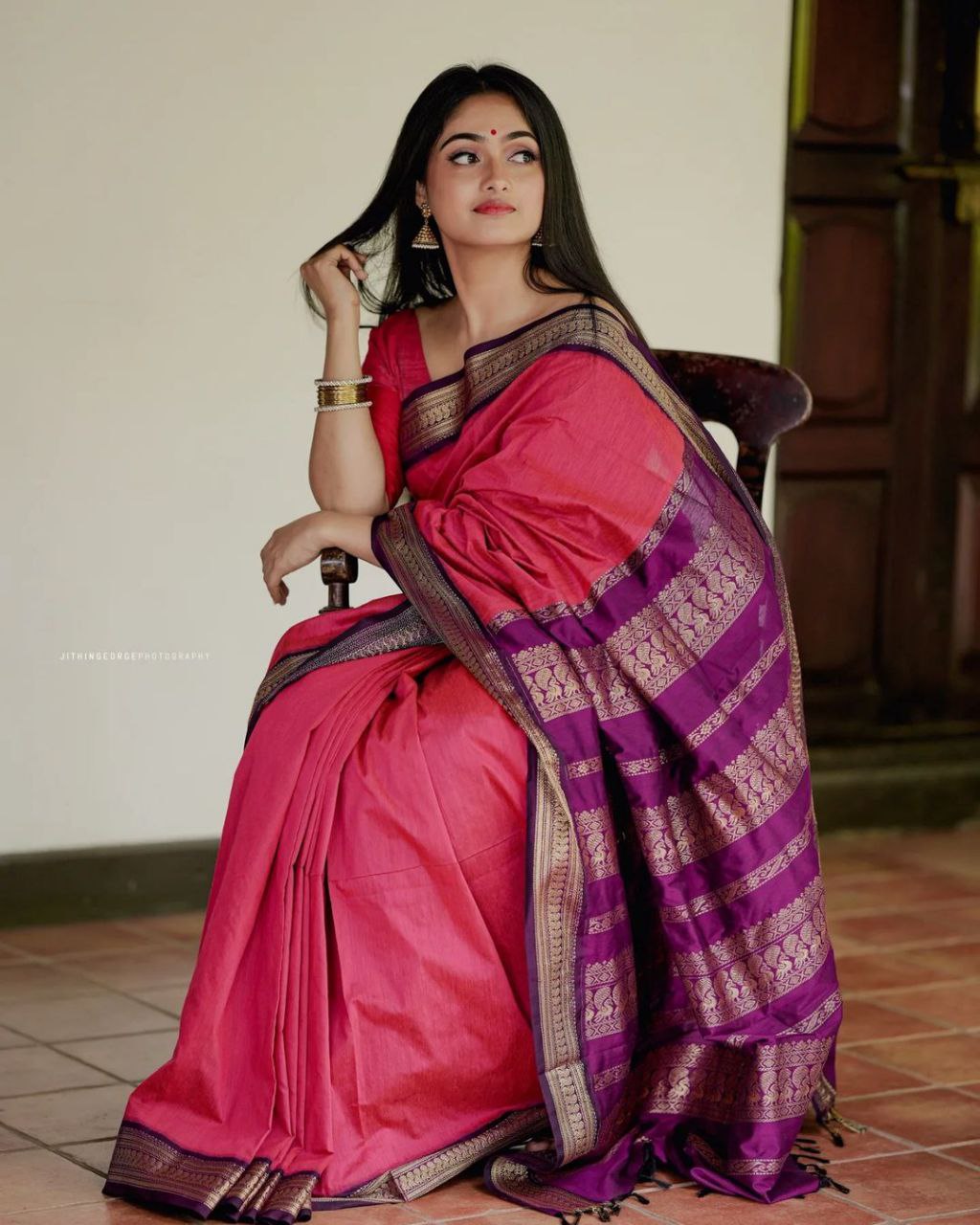 Graceful Pink Kanjivaram Soft Silk Saree Featuring Matching Border, Perfect for Weddings