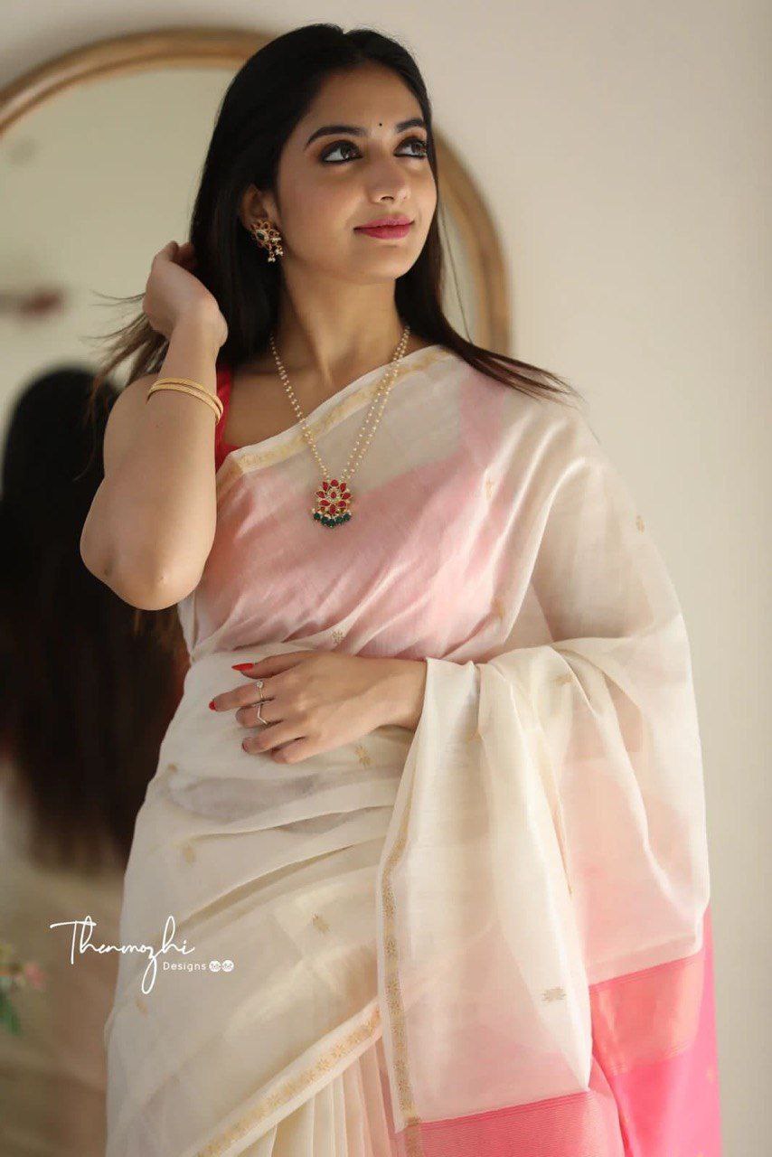 Timeless White Cotton Saree Featuring a Vibrant Pink Border for Every Occasion